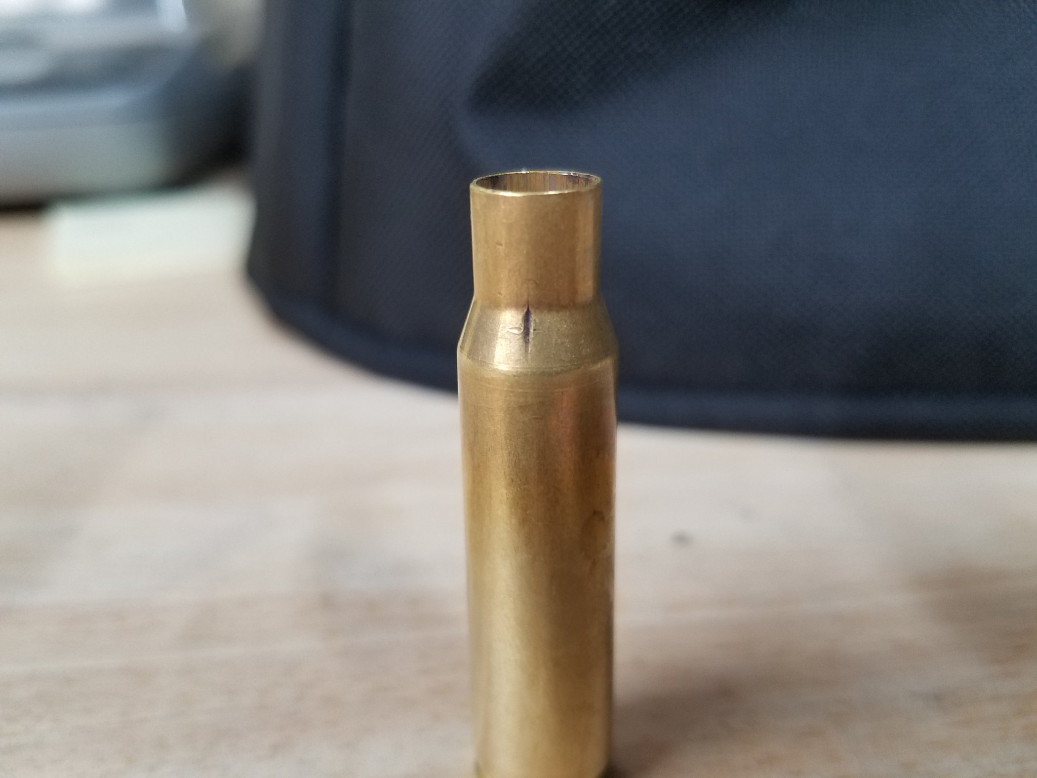 Why is my Hornady 6.5 Creedmoor brass cracking/scratching on the shoulder