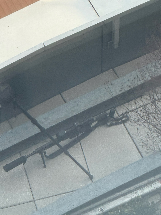 24 12 31 sniper rifle on manhattan roof small.jpg