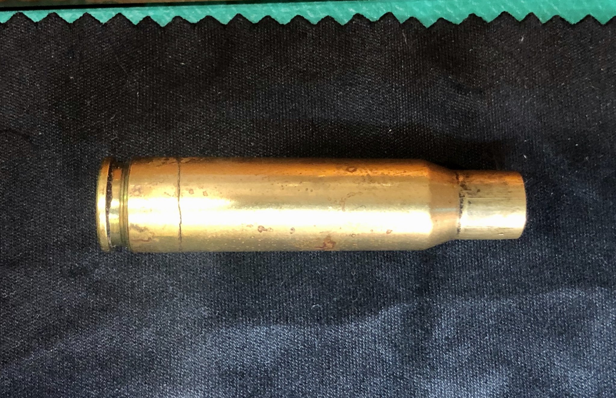 Bulged shells on brass face after firing??