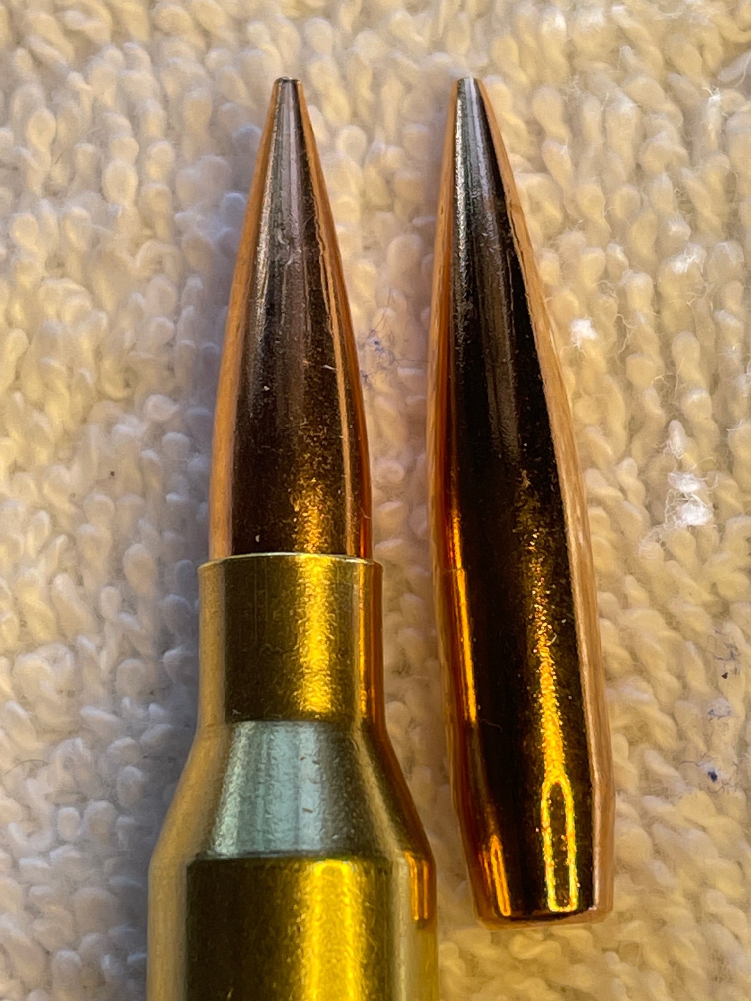 On a rifle cartridge, why are the case mouth and neck on the