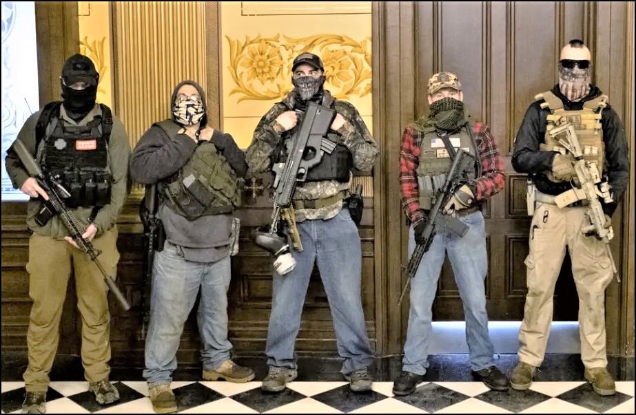 Armed-militia-group-stands-in-front-of-governors-office-to-protest-shutdowns-in-Michigan_-Phot...jpg