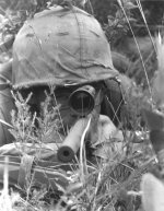 pvt-randall-e-josey-a-marine-sniper-attached-to-co-h-2nd-bn-5th-marines-has-a-bead-on-a-viet-c...jpg