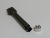 G19 threaded muzzle with white cap.png